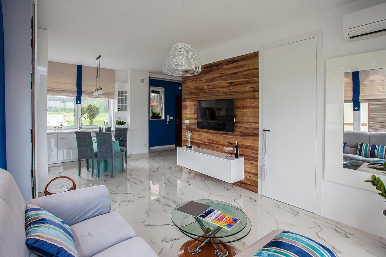 Golf Apartament W Sobieniach Sobienie Jeziory Luaran gambar
